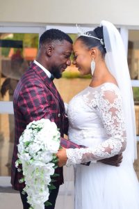 Henry Ipole flaunts his lovely wife in Grand style